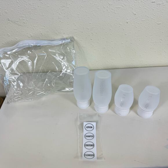 New In Bag 4 Piece Travel Shower Bottles Portable Labels Zippered Pouch Silicone - Picture 1 of 5